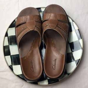 CLARK’S, Slip-On Sandals.  Brown leather shoe.
